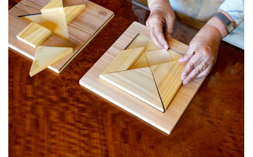 木のおもちゃ パズル ヒノキのタングラム 山のくじら舎 木製 木 おもちゃ 知育玩具 男の子 女の子 ギフト プレゼント 贈り物 贈答 お祝い 出産祝い 誕生日祝い 手作り てづくり 高知県 国産 ヒノキ 図形 シルエット 頭の体操 指先トレーニング 五感 香り 手触り 家族 シニア おじいちゃん おばあちゃん 孫 7個 土台 1個 ガイドブック 1冊 安芸市 高知県